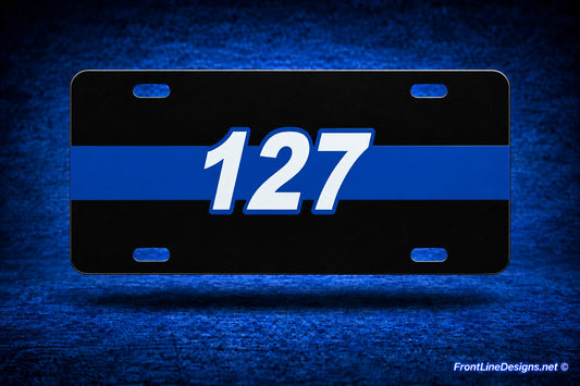 FrontLine license plate on matching blue textured backdrop