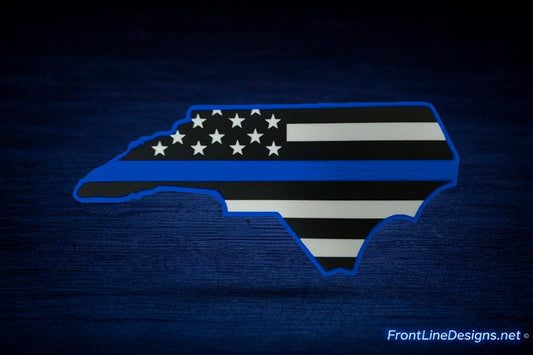 North Carolina US Flag Blue Line Reflective Decal on matching textured background