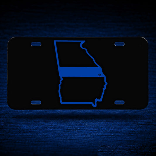 Georgia State Blue Line Reflective License Plate — floating product on blue textured backdrop