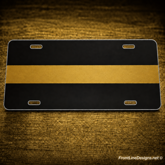 Custom reflective Gold Line aluminum license plate on matching gold textured backdrop
