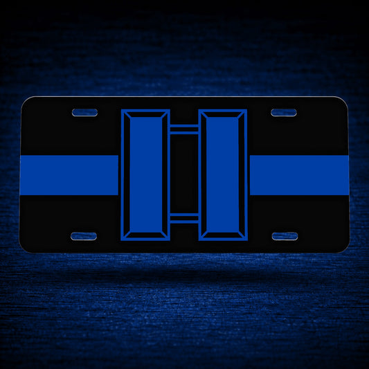 Blue Line Captain License Plate — floating product on blue textured backdrop