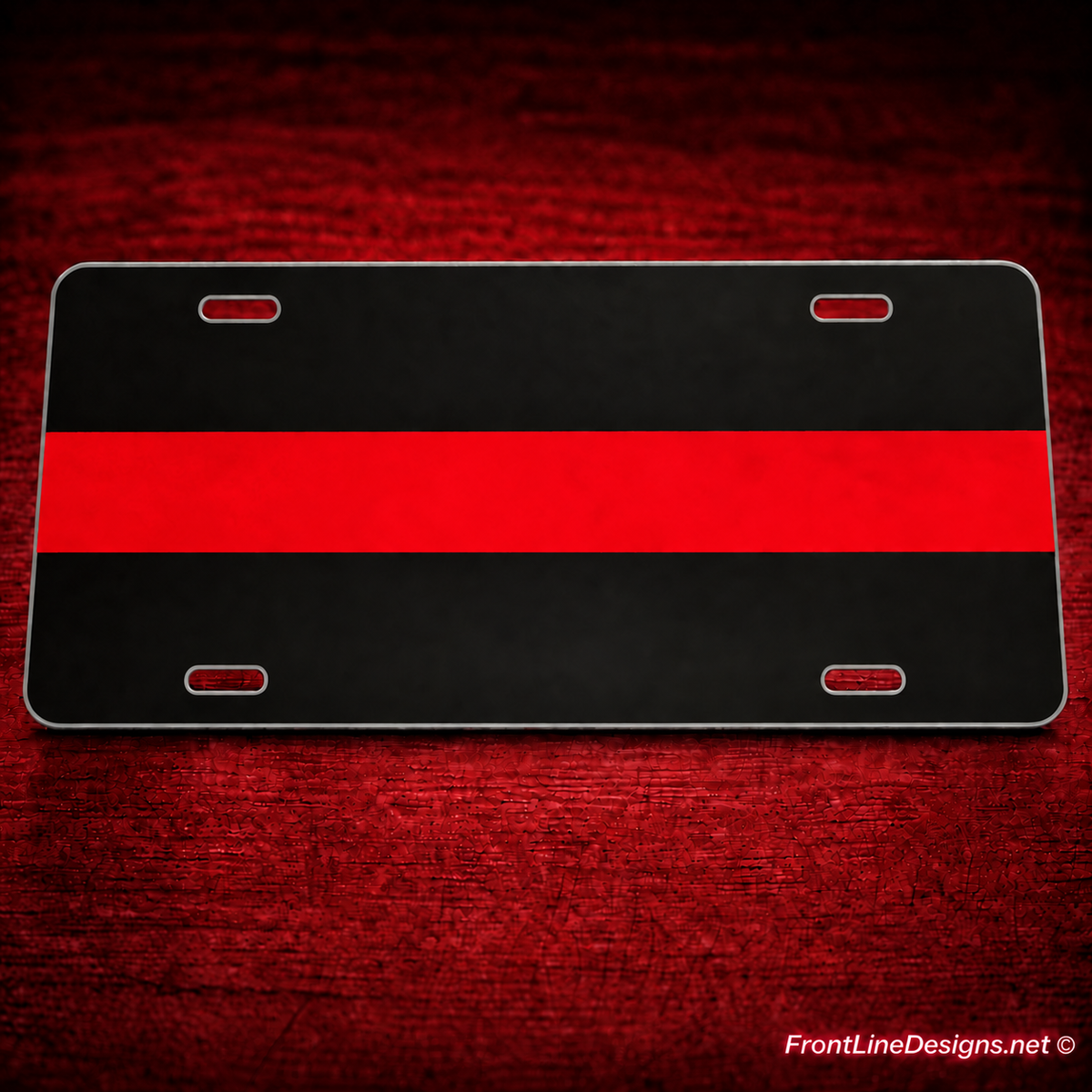 Custom reflective Red Line aluminum license plate on matching red textured backdrop