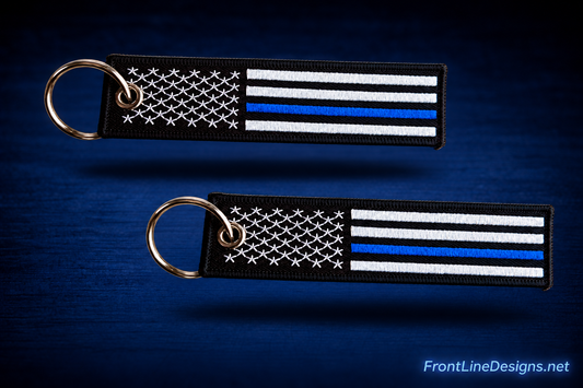 Two identical US Blue Line embroidered keychains, each with a metal key ring